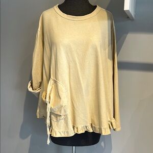 Cream Women's Top with Ruffle Hem